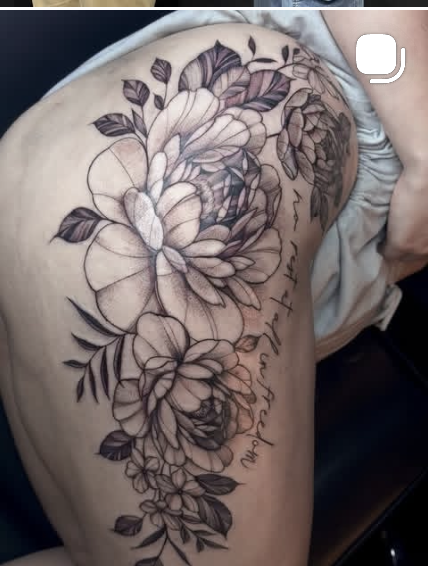 Fine line floral tattoo by Allee B.
